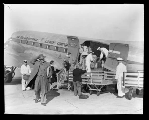 National Airways Corporation (NAC), unloading passengers and freight at Whenuapai Aerodrome, Waitakere, Auckland