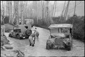 Drivers of New Zealand Division vehicles, washing down trucks in a stream near Alife, Italy - Photograph taken by George Frederick Kaye