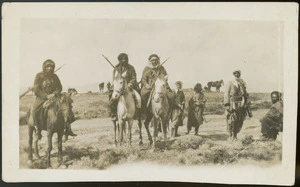 Armed Arabs on horses