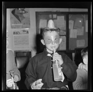 Unidentified National Airways Corporation Orphan drinking his soda