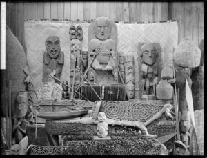 Display of Maori carvings and artefacts - Photograph taken by William Henry Thomas Partington