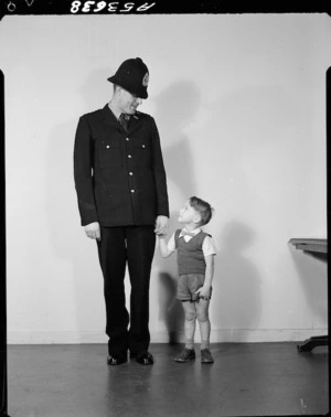Policeman with small boy