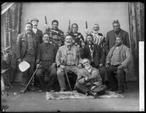 Portrait of nine Maori men, including Waata Hipango and Takarangi Metekingi, and two Europeans - Photograph taken by William Henry Thomas Partington