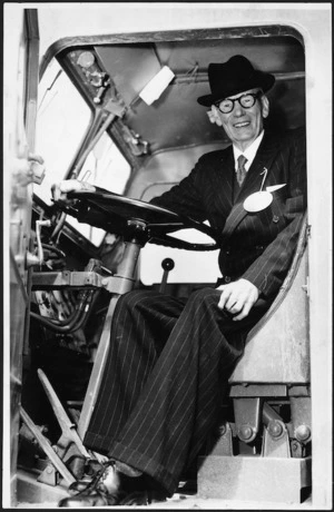 Robert Semple, former Minister of Public Works, at the controls of an earth-moving machine, Berhampore