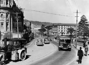 View of trucks and buses travelling up Molesworth Street, Thorndon, Wellington
