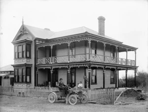 Two storied house with Reo buggy alongside, Nelson
