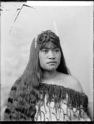 Unidentified Maori woman wearing a tag cloak