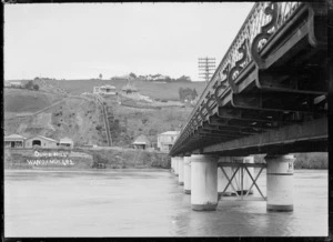 View of Durie Hill with part of the bridge which crosses the Wanganui River, leading from Durie Hill to Victoria Avenue