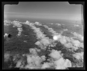 Clouds over the Wairarapa seen from a National Airways Corporation (NAC) Viscount aircraft, Wellington Region