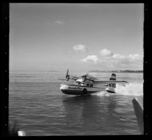 Tourist Air Travel, Grumman Widgeon aircraft on water, Devonport, Auckland