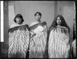 Portrait of three young Maori women, two of whom are identified as Taapu Winiata and Rawinia Wamikau - Photograph taken by William Henry Thomas Partington