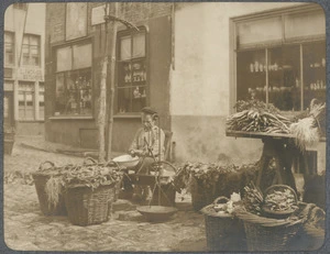 Street vegetable stall in an unidentified town.