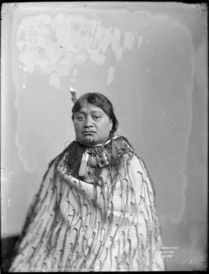 Unidentified Maori woman wearing a tag cloak - Photograph taken by Frank J Denton