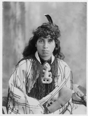 Susan, Rotorua; shows a young Maori woman with a tiki around her neck - Photograph taken by Josiah Martin