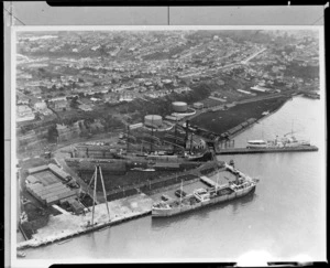 View of a large sailing ship, probably Magdelene Vinnen, in the Calliope dry dock at Devonport, Auckland City