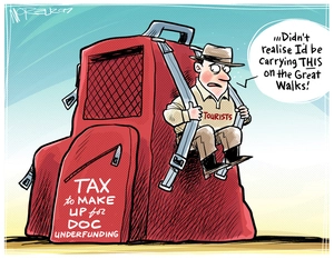 A tourist struggles to carry his red backpack of tax which makes up for DOC underfunding