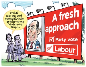 Two people comment on the Labour Party election billboard featuring Andrew Little as a removable image