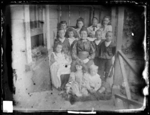 Group portrait of Amy Kirk and several children