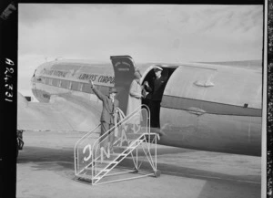 Passengers boarding New Zealand National Airways Corporation (NAC) aircraft at Paraparaumu aerodrome, Wellington - Photograph taken by Mr W Walker