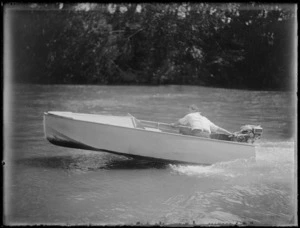 Robert Wells in speedboat on Mokau River
