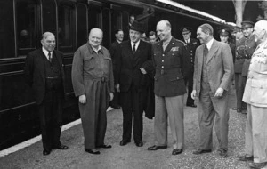 William Lyon Mackenzie King, Winston Churchill, Peter Fraser, Dwight D Eisenhower, Godfrey Huggins and Jan Christian Smuts during a train journey to inspect Allied troops