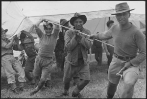 Maori soldiers erecting a marquee at a military training camp - Photograph taken by George Stephenson