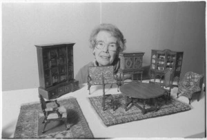 Maureen Barker with a display of her miniatures