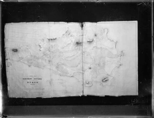 Photograph of a map of Otago Peninsula by Charles H Kettle titled Index map of the suburban sections in the settlement of Otago