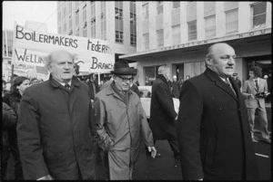 Trade unionists Jim Knox, Leonard Hadley, and Frank Thorn, marching, during a demonstration in Wellington