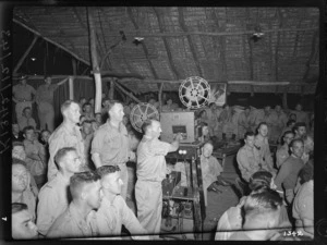 World War II soldiers watching a film, probably Pacific area