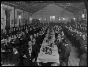 Men seated at dining tables, Union Boating Club, Christchurch