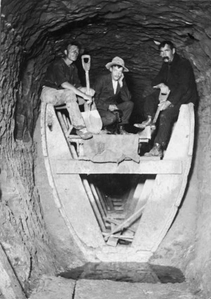 Construction workers in an Auckland Metropolitan Drainage Board sewerage tunnel