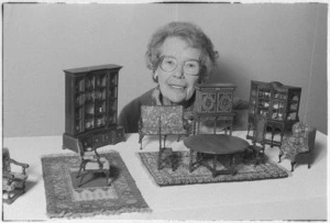 Maureen Barker with a display of her miniatures