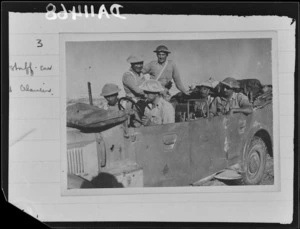 Members of 28 (Maori) Battalion with German staff car, El Alamein, Egypt - Photograph taken by Dr C N D'Arcy