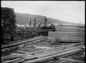 Timber stacked in sawmill yard