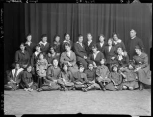 "Maori girls" a school group with clergyman
