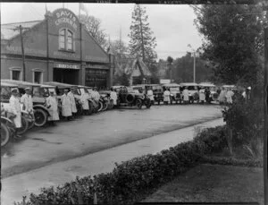 Motor cars and unidentified drivers outside the business premises of David Crozier Limited, motor car importers and engineers, Christchurch