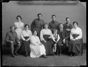 Lieutenant Wilson and family, with several men in army uniform