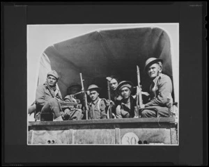Members of the 28th New Zealand (Maori) Battalion on the last stage of a journey between Alamein to Tripoli - Photograph taken by Harold Gear Paton