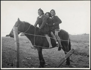 Maori school girls on horseback, Te Kaha, Bay of Plenty
