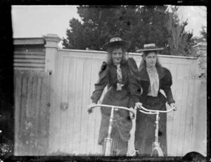 Two girls on bicycles