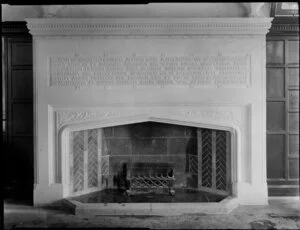 A large stone fireplace with a Latin inscription dedicated to the Reverend FA Hare, Hare Memorial Library, Christ's College, Christchurch