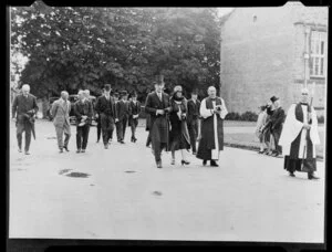 Sir Charles Fergusson and Lady Alice Fergusson, with Bishop Campbell West-Watson, walking in the grounds at Christ's College, Christchurch
