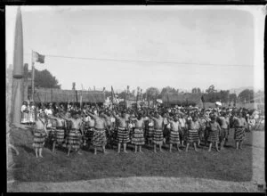 Maori performing a haka with taiaha, New Zealand International Exhibition Christchurch 1906-1907
