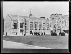 View of dining hall exterior and quadrangle, including members of staff wearing academic robes, Christ's College, Christchurch