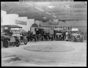 Various motorcars on display in a showroom/garage, Christchurch