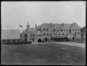 Quadrangle and buildings at Christ's College, Christchurch, including Big School and group of students standing next to School House