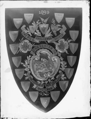 The DCL Challenge Sheild presented by The League of New Zealand Wheelmen 1899. Includes cycling awards to J Lloyd (1899), T E Whitfield (1901), S Boyd (1901), W Langdon (1903), A A Napier (1906), S Gudsell, and H Bowley (1916?)