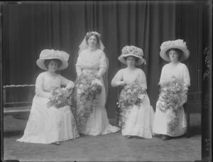 Bride and three bridesmaids with floral bouquets, wedding of F Potter [Christchurch?]