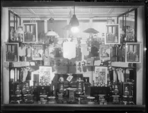 Display of gas heaters and lamps and hot water bottles in shop window